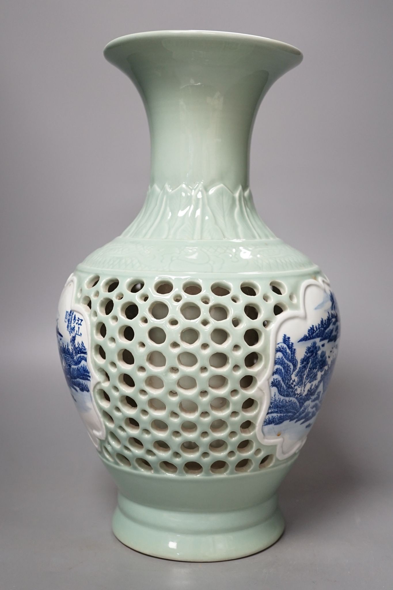 A Chinese double walled celadon ground vase, 37.5 cm high